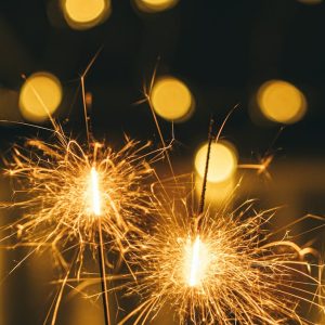 a couple of sparklers sitting on top of a table