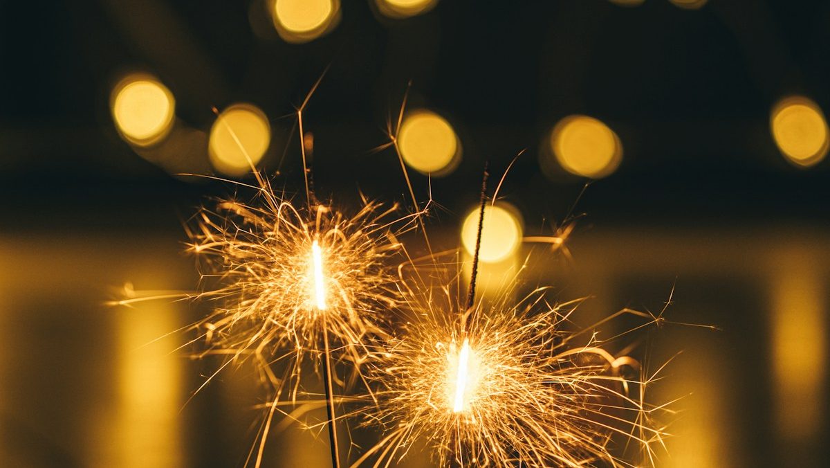 a couple of sparklers sitting on top of a table